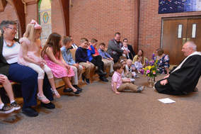 Picture of children with pastor